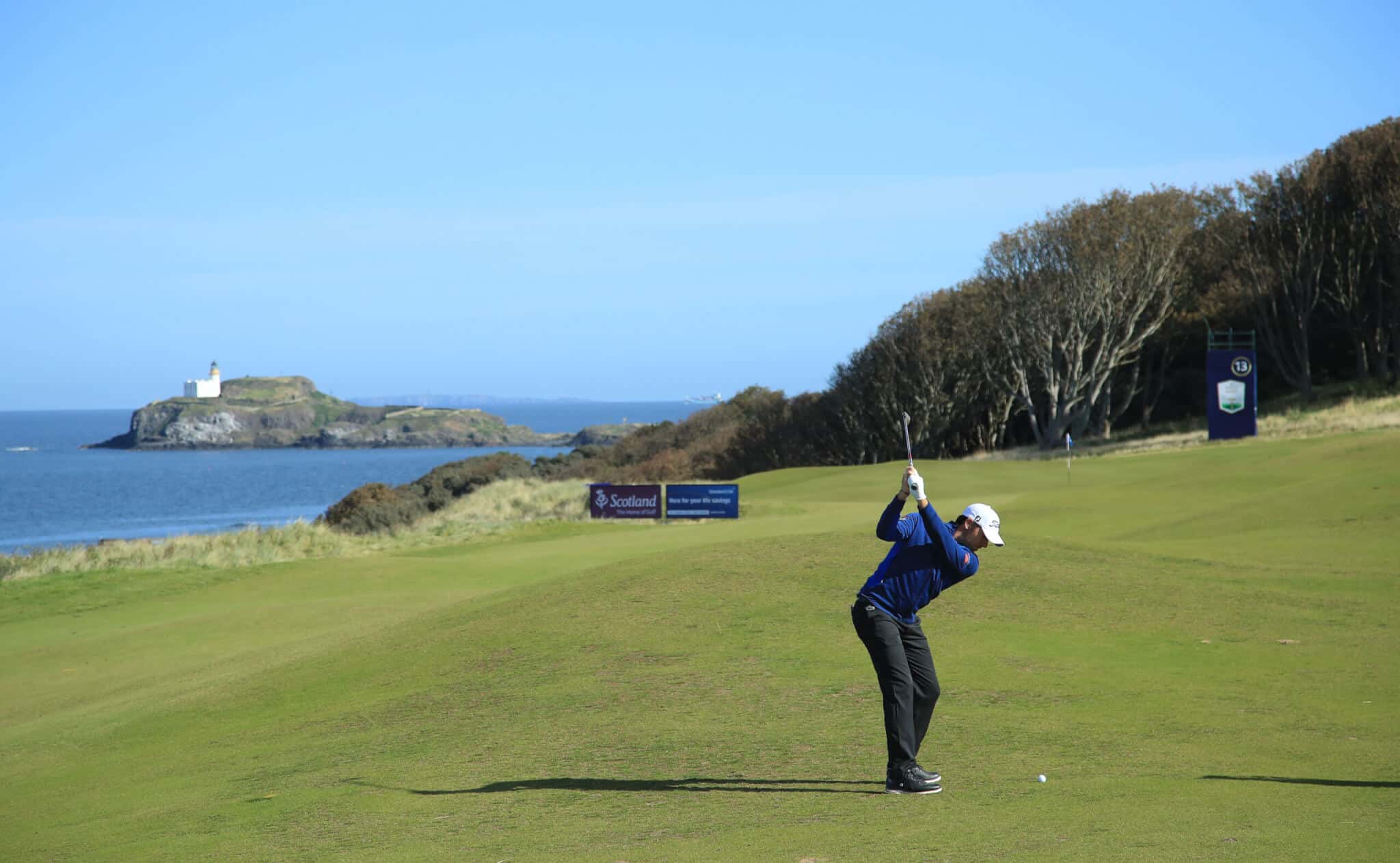 NORTH BERWICK, SCOTLAND - SEPTEMBER 29: Julien Guerrier of France plays his second shot on the 13th hole during a practice round prior to the start of the Aberdeen Standard Investments Scottish Open at The Renaissance Club on September 29, 2020 in North Berwick, Scotland. (Photo by Andrew Redington/Getty Images)